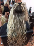 Hairloom - applying blond hair extensions