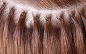 Strand by strand hair extensions